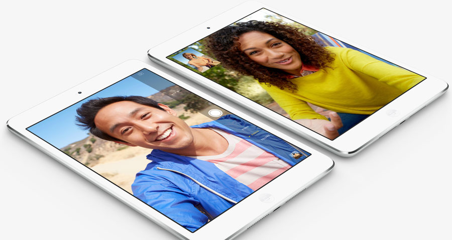 Two iPad mini 2 side by side, angled to the right, with screen showing a video chat